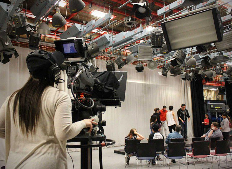 Students filming at the TV studio