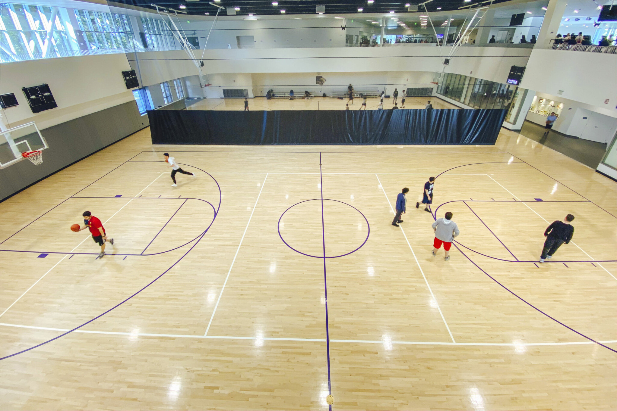One of the two-court gyms at the Mashouf Wellness Center